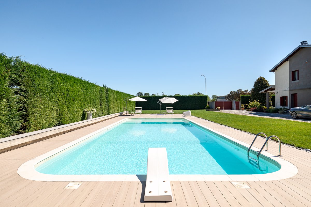 Living area before consistent lighting — flat midday