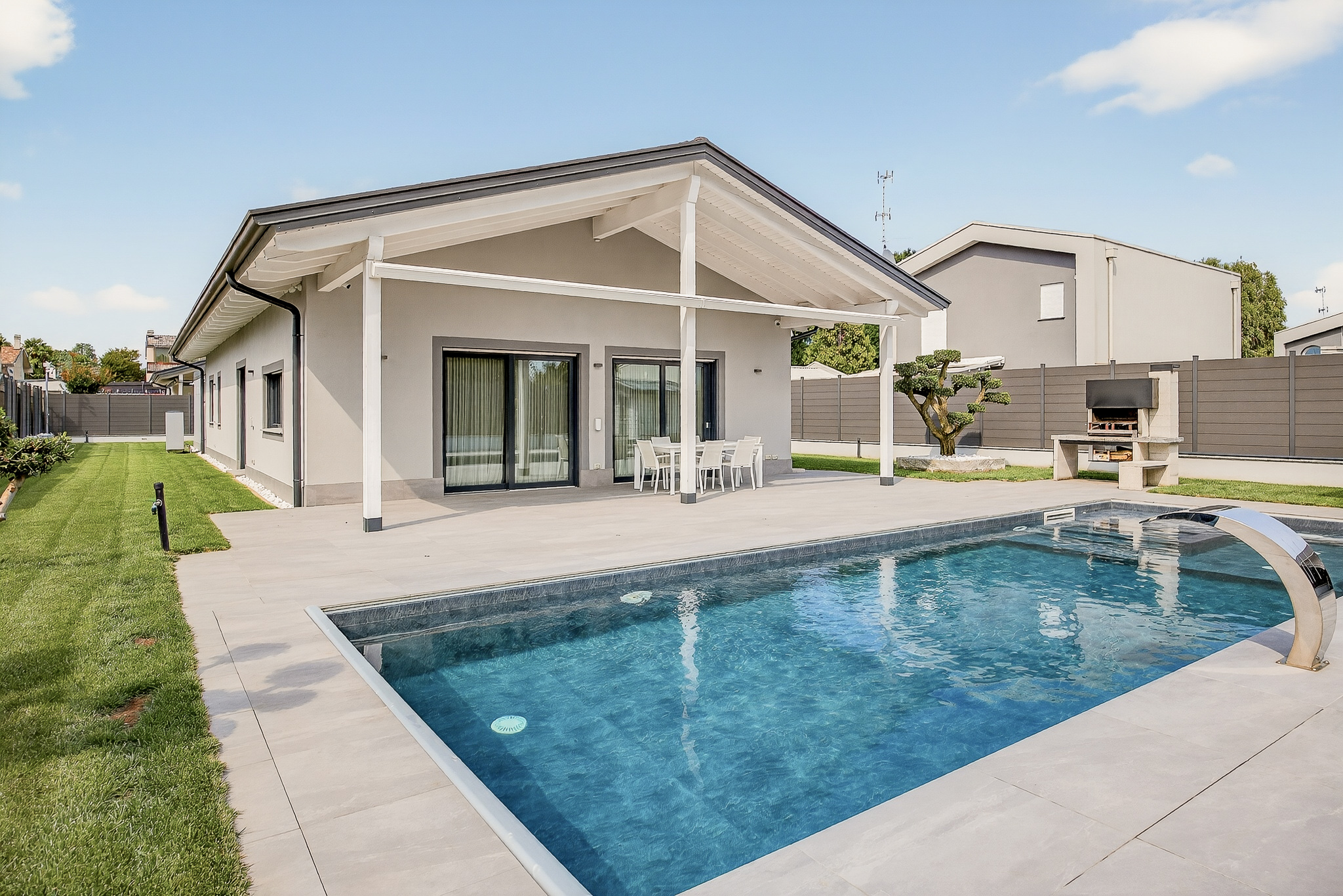 Exterior before — flat midday