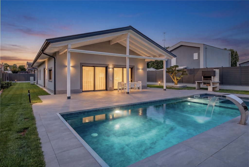 Exterior — cinematic twilight pool